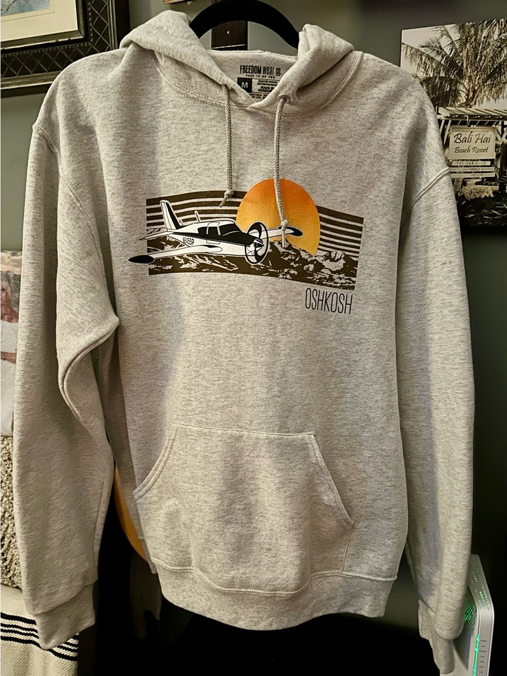 OshKosh EAA Men’s Gray Pullover Hoodie with Sunset Plane Graphic